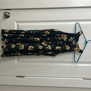 Dark green halter top dress with yellow flowers